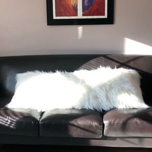White faux fur pillow
